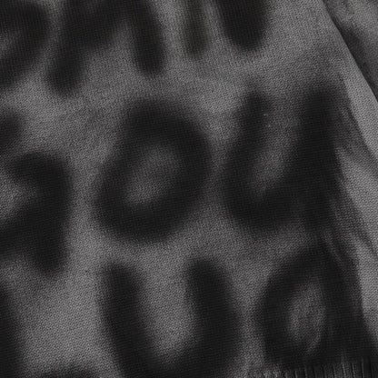 Spray painted graffiti letters round neck knitted sweater