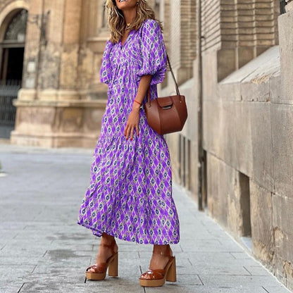 Kleid mit geometrisch bedruckten Puffärmeln