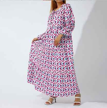 Kleid mit geometrisch bedruckten Puffärmeln