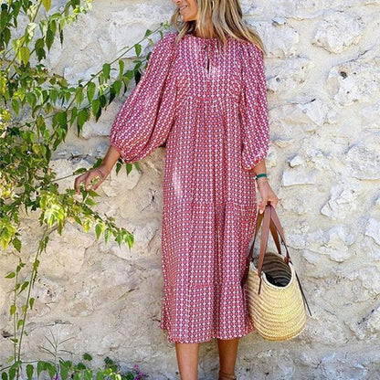 Kleid mit geometrisch bedruckten Puffärmeln