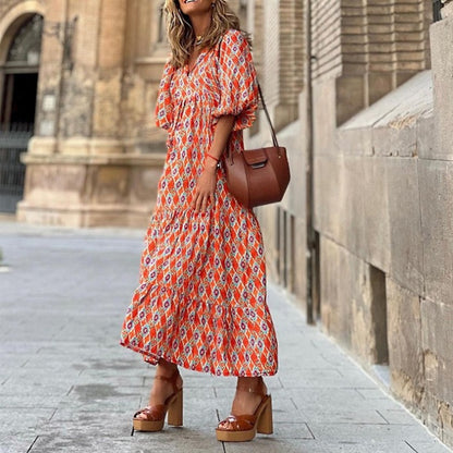 Kleid mit geometrisch bedruckten Puffärmeln