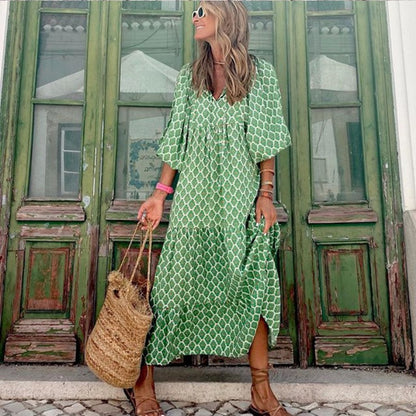 Kleid mit geometrisch bedruckten Puffärmeln
