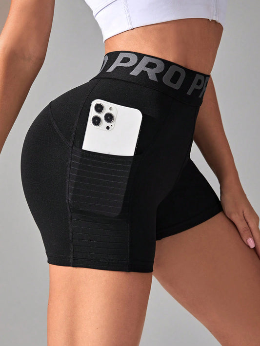 Yoga Basic Letter Tape Waist Sports Shorts With Phone Pocket