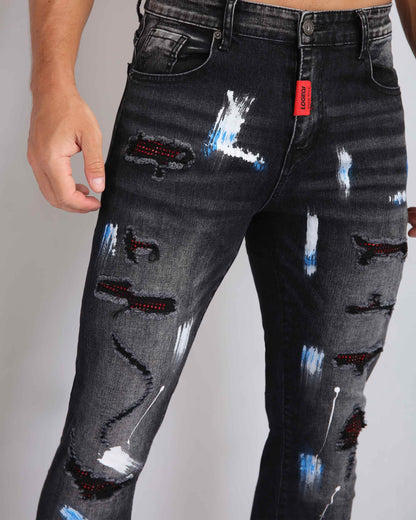 Street Art Chic zerrissene schwarze Jeans mit Graffiti-Farbzeichnung 