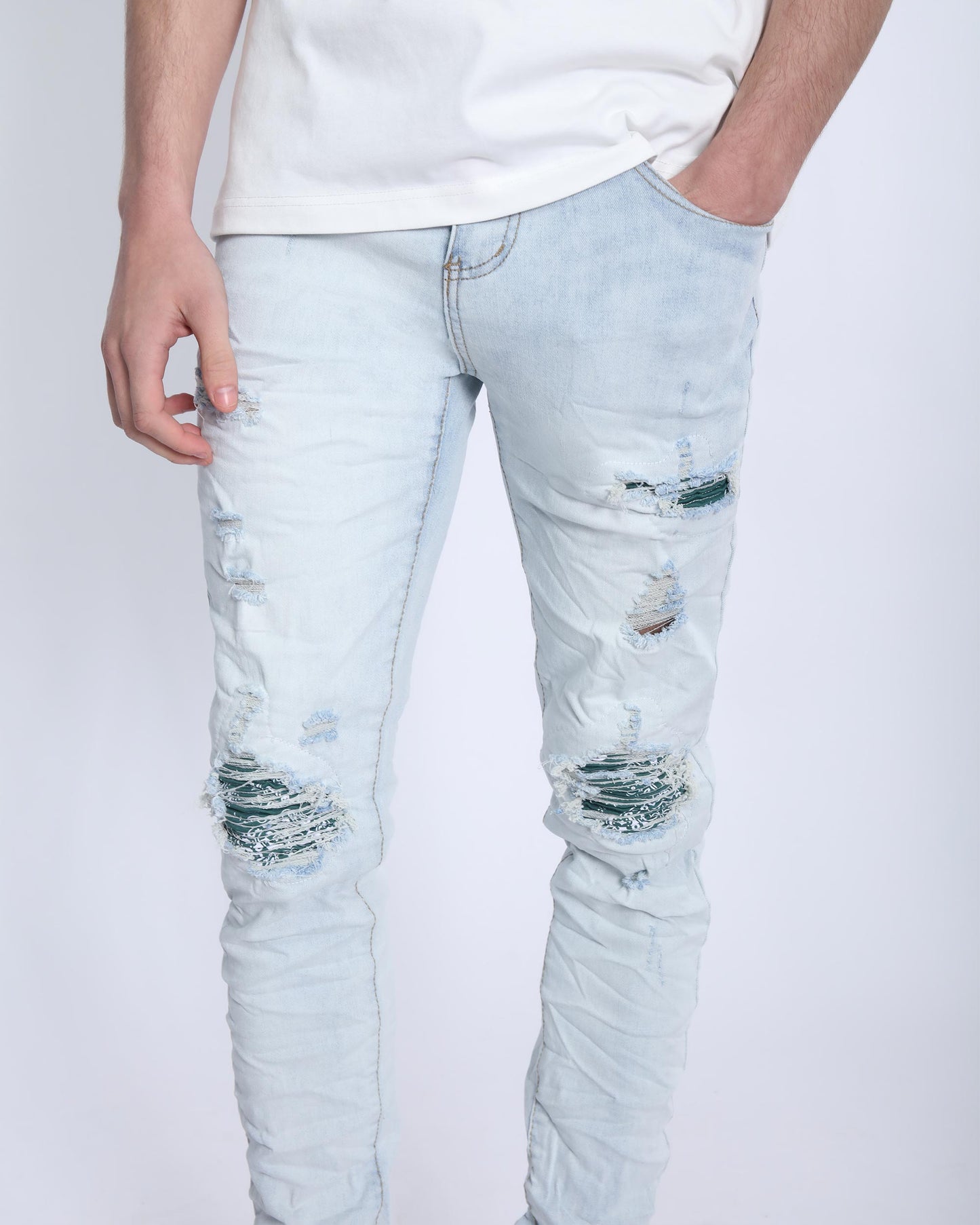 Light Wash Ripped Blue Jeans with Green Cashew flower patch