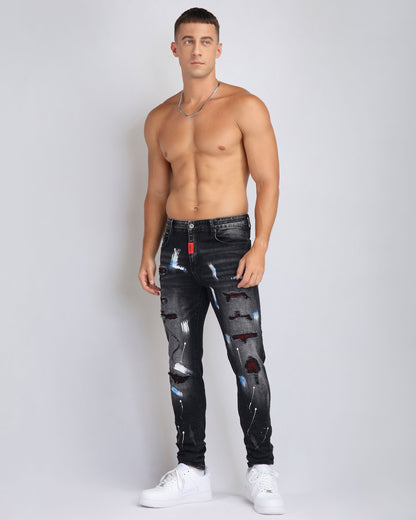 Street Art Chic zerrissene schwarze Jeans mit Graffiti-Farbzeichnung 