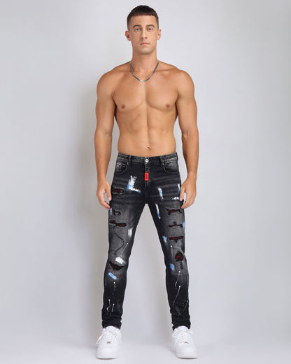 Street Art Chic zerrissene schwarze Jeans mit Graffiti-Farbzeichnung 
